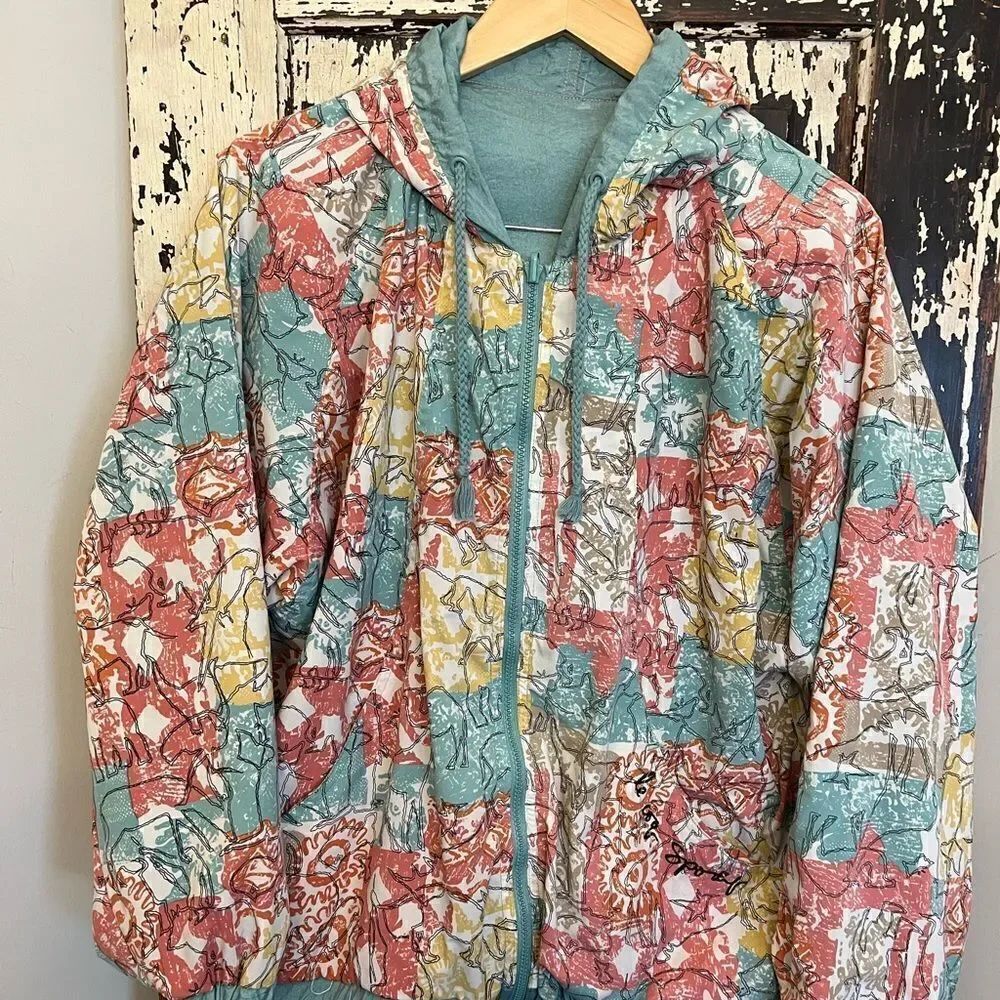 Rare women’s retro Le Coq sportif reversible hooded jacket.